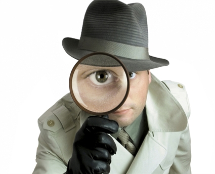 Detective-with-magnifying-glass